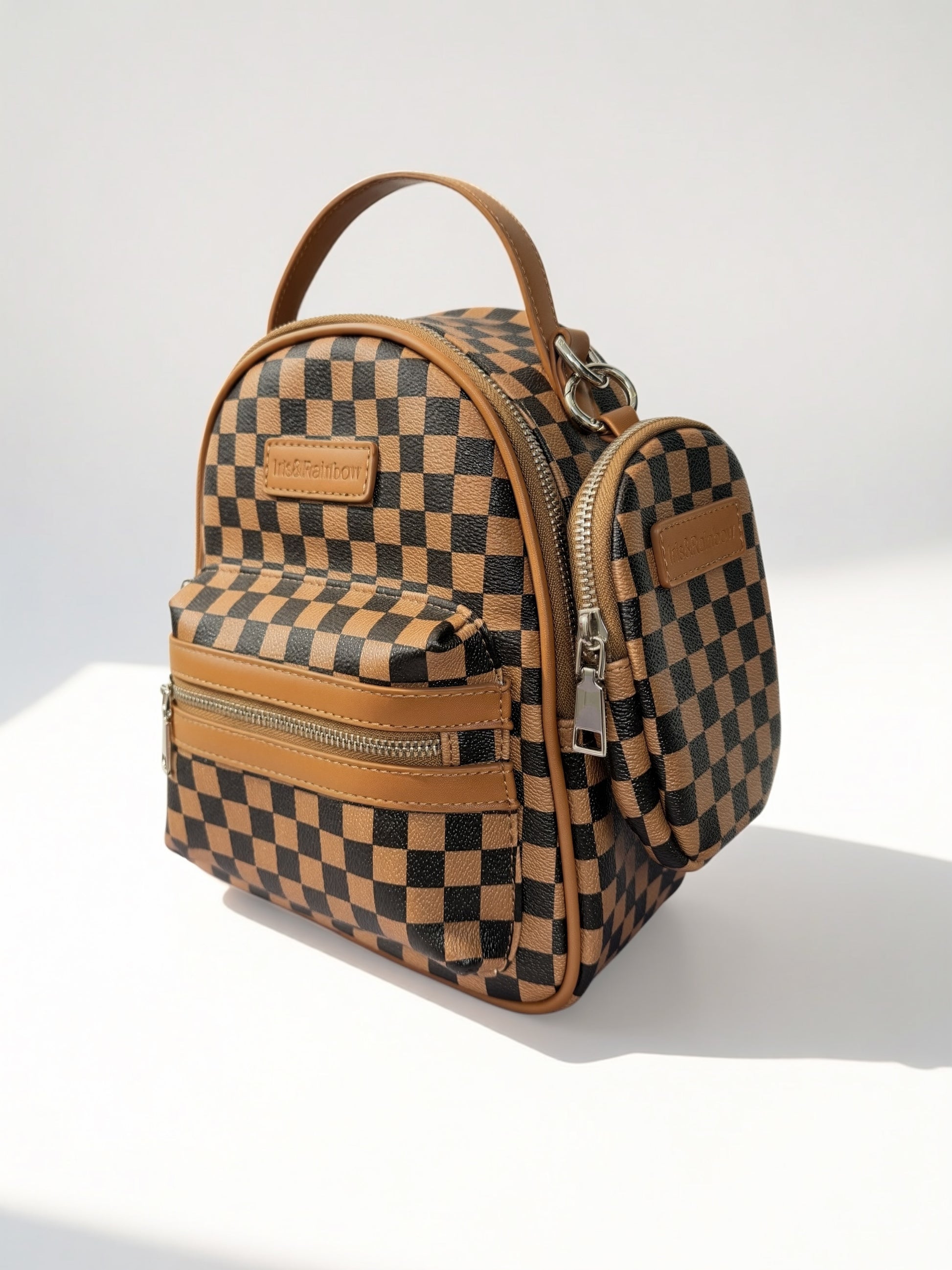 brown checkered mini backpack Mid-Size Tan Young and Rad Co The front of the backpack features a BinkyBro logo The Iris Street Chic Mini
