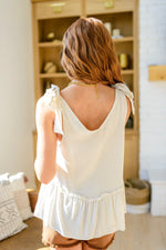 All Tied Up Peplum Tank*