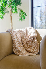 Fuzzy Feeling Blanket In Tan Winter22